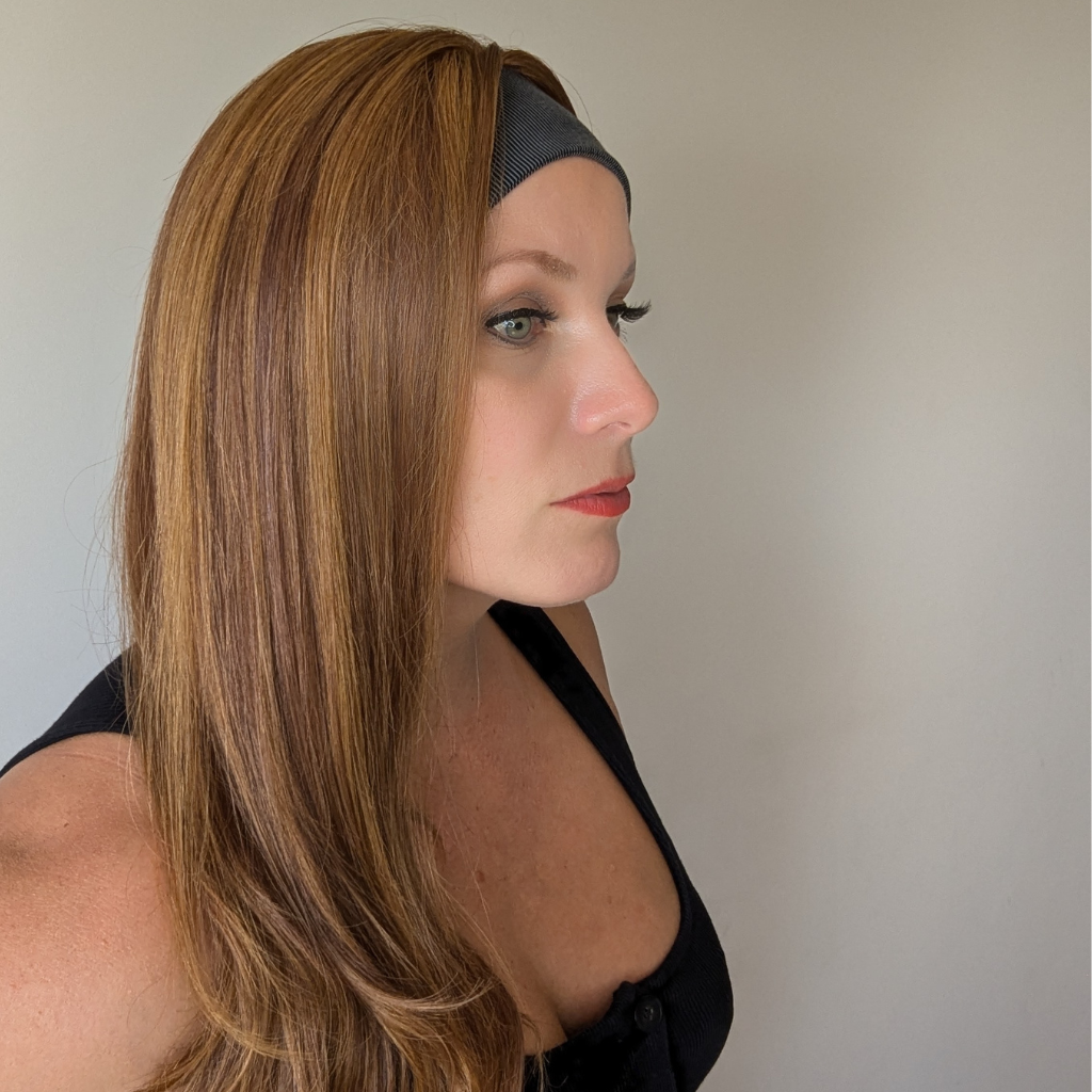 Natural blonde human hair headband wig styled in a side ponytail